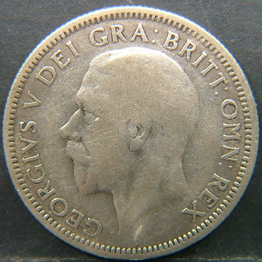 Back side of 🇬🇧 United Kingdom – Monarchs and Milestones 1 Shilling  1931 object