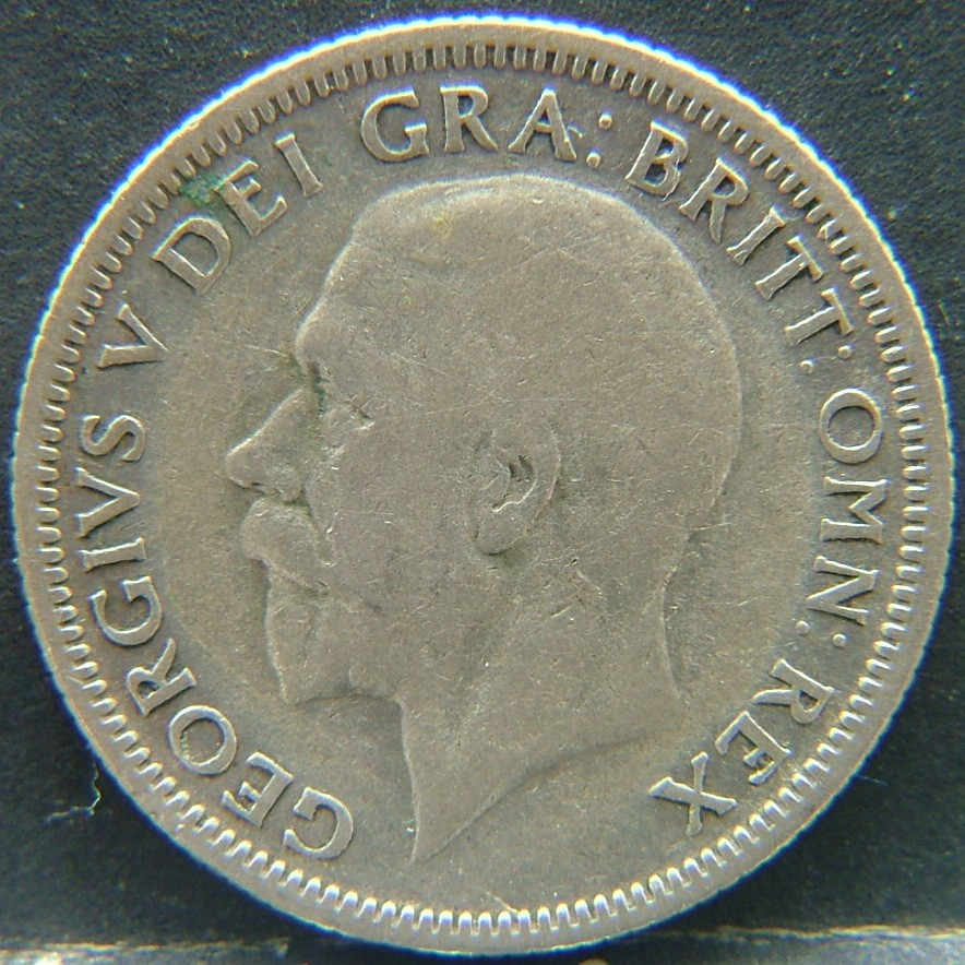 Front side of 🇬🇧 United Kingdom – Monarchs and Milestones 1 Shilling 1933 coin