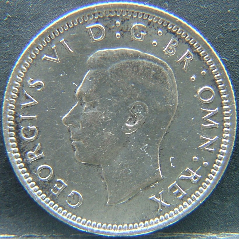Front side of 🇬🇧 United Kingdom – Monarchs and Milestones 6 Pence 1940 coin