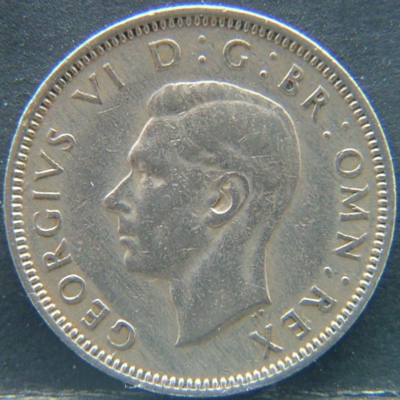 Front side of 🇬🇧 United Kingdom – Monarchs and Milestones 1 Shilling Scot 1947 coin