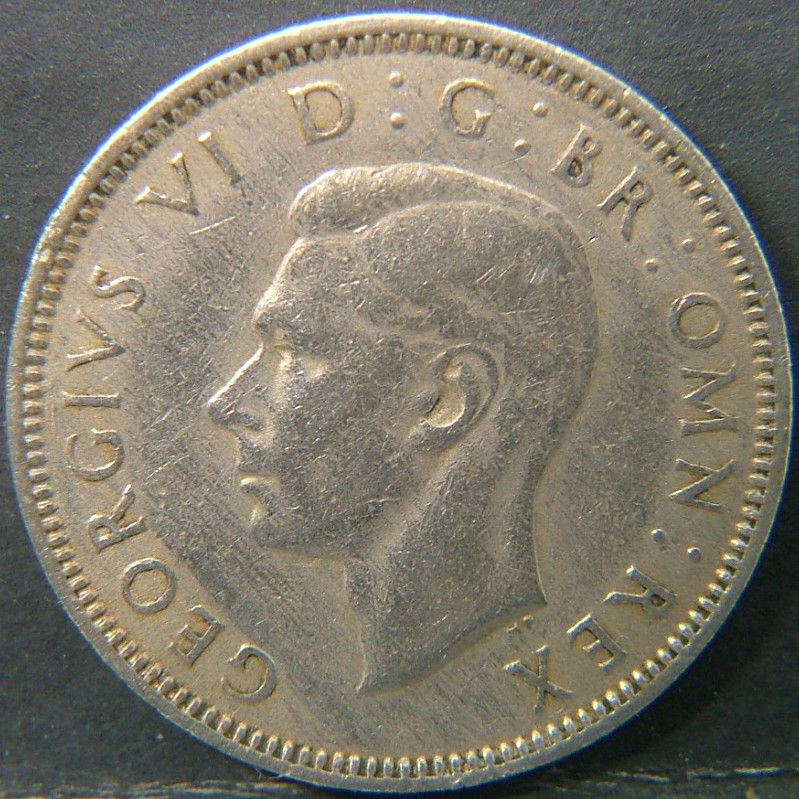 Back side of 🇬🇧 United Kingdom – Monarchs and Milestones 1 Shilling Scot  1947 object