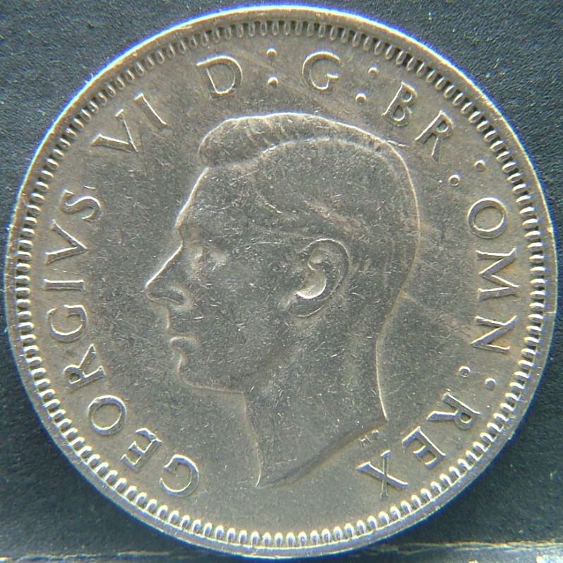 Front side of 🇬🇧 United Kingdom – Monarchs and Milestones 1 Shilling Eng 1947 coin