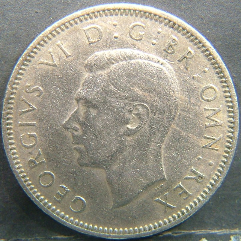 Back side of 🇬🇧 United Kingdom – Monarchs and Milestones 1 Shilling Eng  1947 object