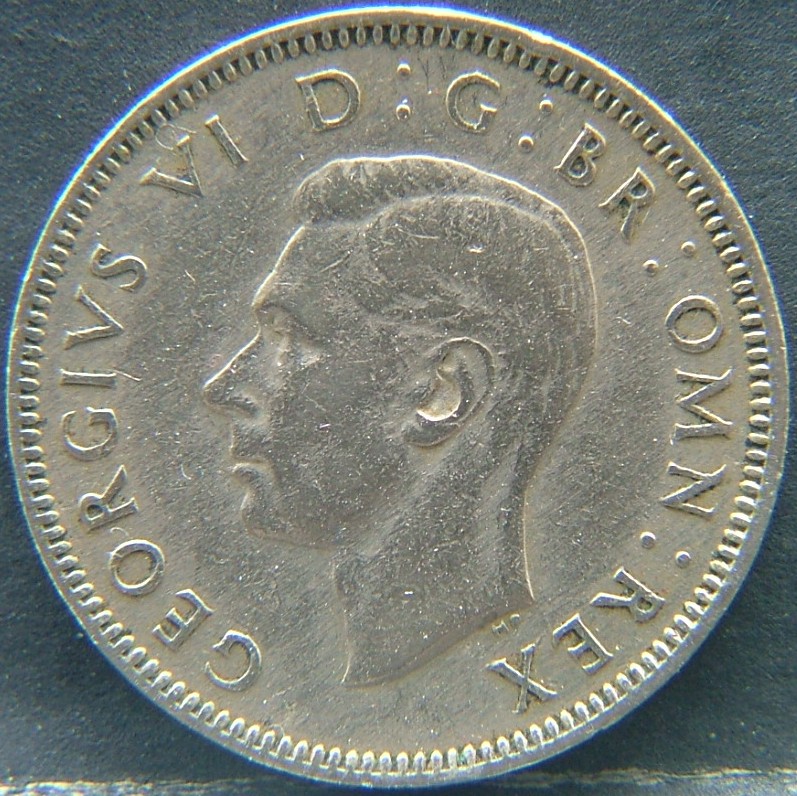 Front side of 🇬🇧 United Kingdom – Monarchs and Milestones 1 Shilling Eng 1948 coin