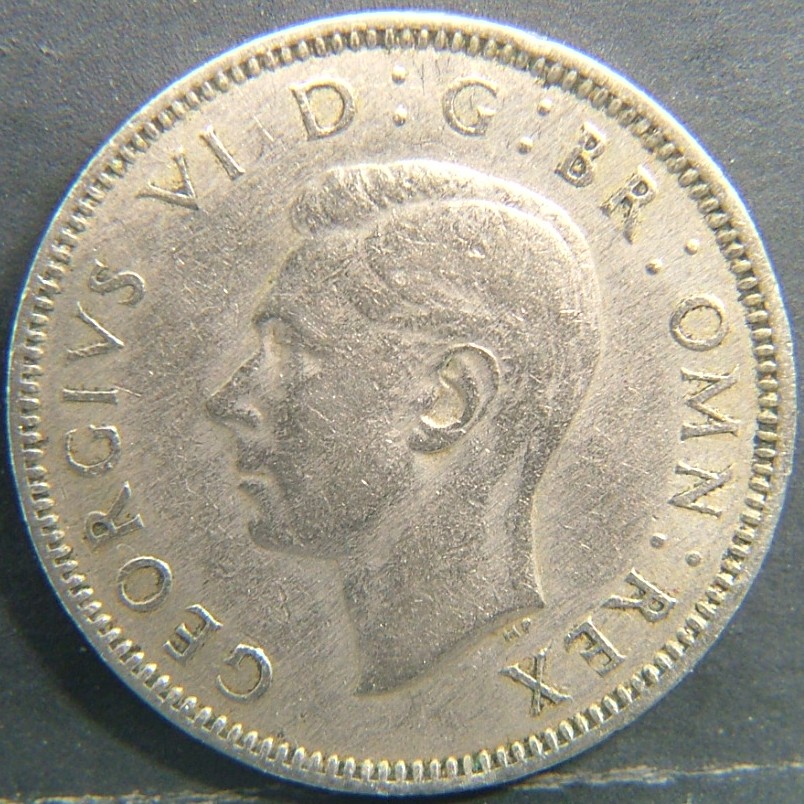 Back side of 🇬🇧 United Kingdom – Monarchs and Milestones 1 Shilling Eng  1948 object