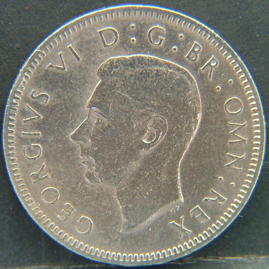 Front side of 🇬🇧 United Kingdom – Monarchs and Milestones 1 Shilling Eng 1948 coin