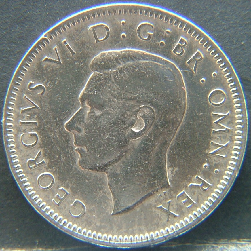 Front side of 🇬🇧 United Kingdom – Monarchs and Milestones 1 Shilling Eng 1948 coin