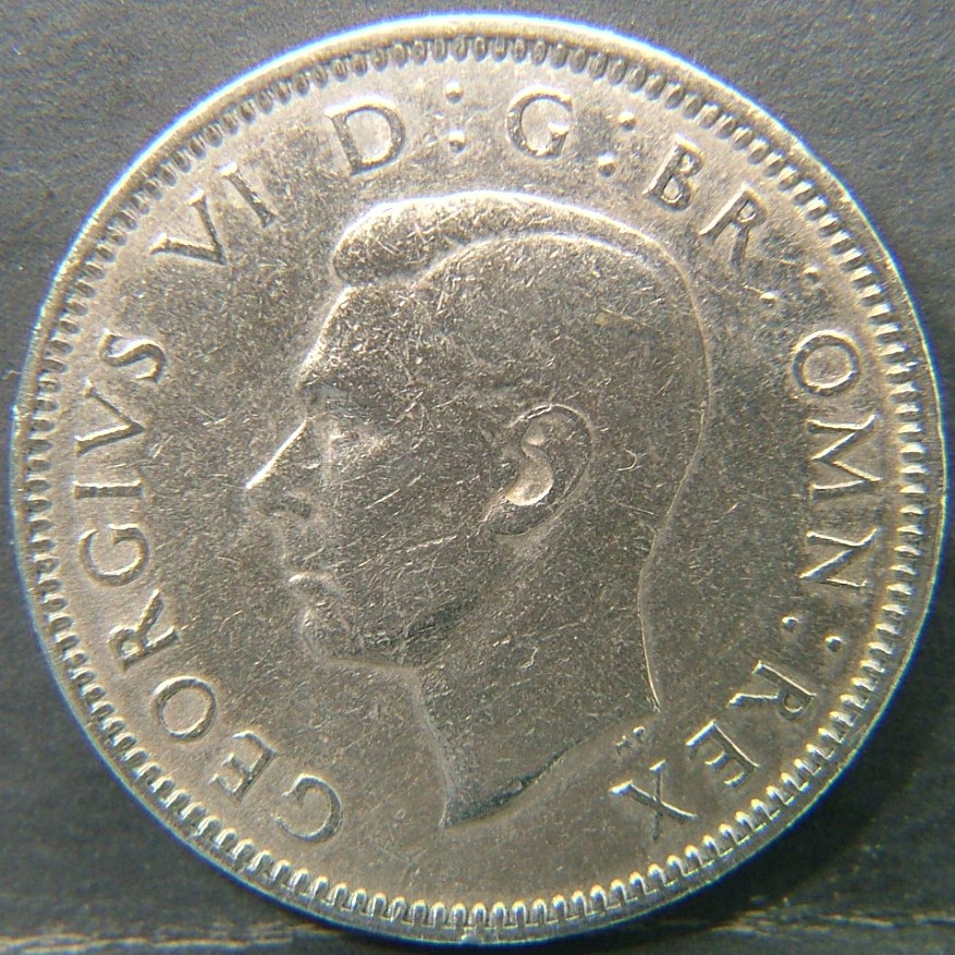 Back side of 🇬🇧 United Kingdom – Monarchs and Milestones 1 Shilling Eng  1948 object
