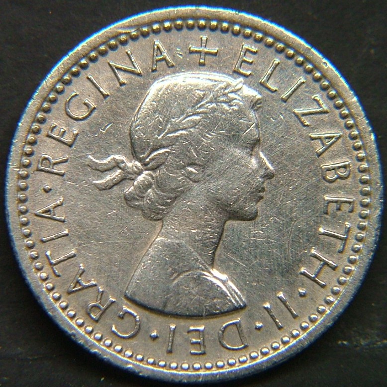 Back side of 🇬🇧 United Kingdom – Monarchs and Milestones 6 Pence 1964 coin