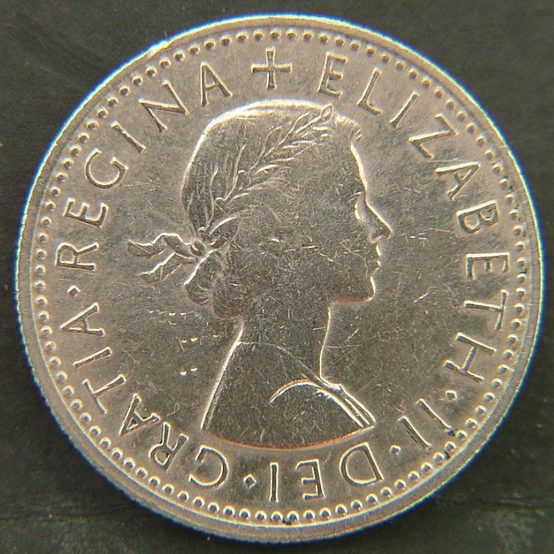 Back side of 🇬🇧 United Kingdom – Monarchs and Milestones 6 Pence 1965 coin