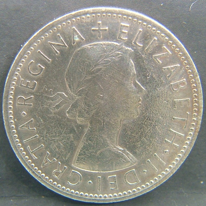 Back side of 🇬🇧 United Kingdom – Monarchs and Milestones 2 Shillings 1963 coin