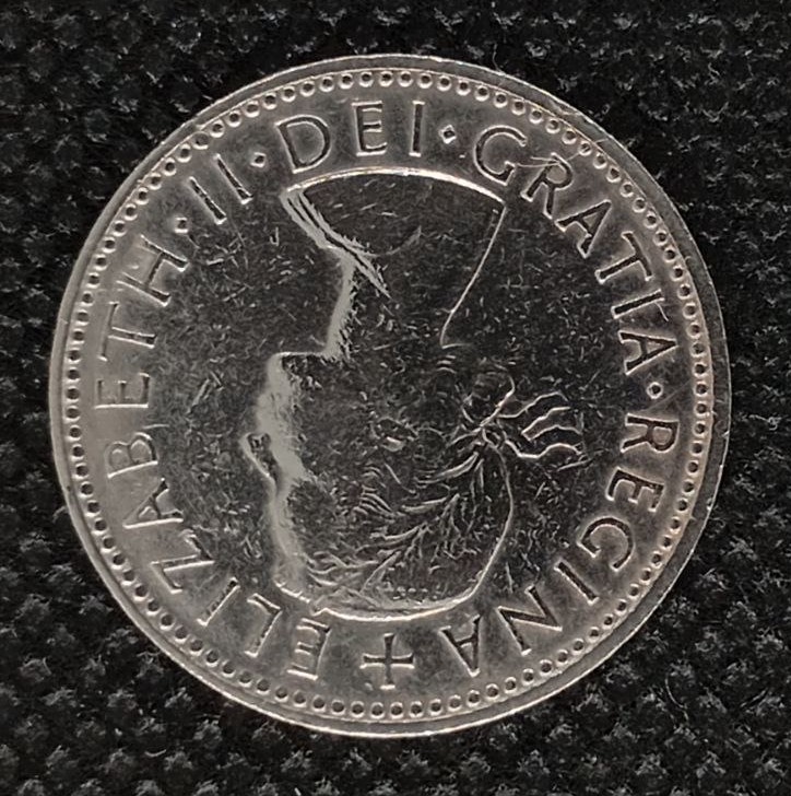 Back side of Great Britain 1 Shilling 1961 coin