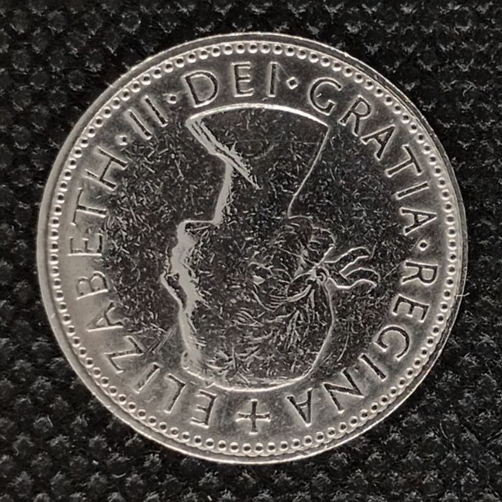 Back side of Great Britain 1 Shilling 1962 coin