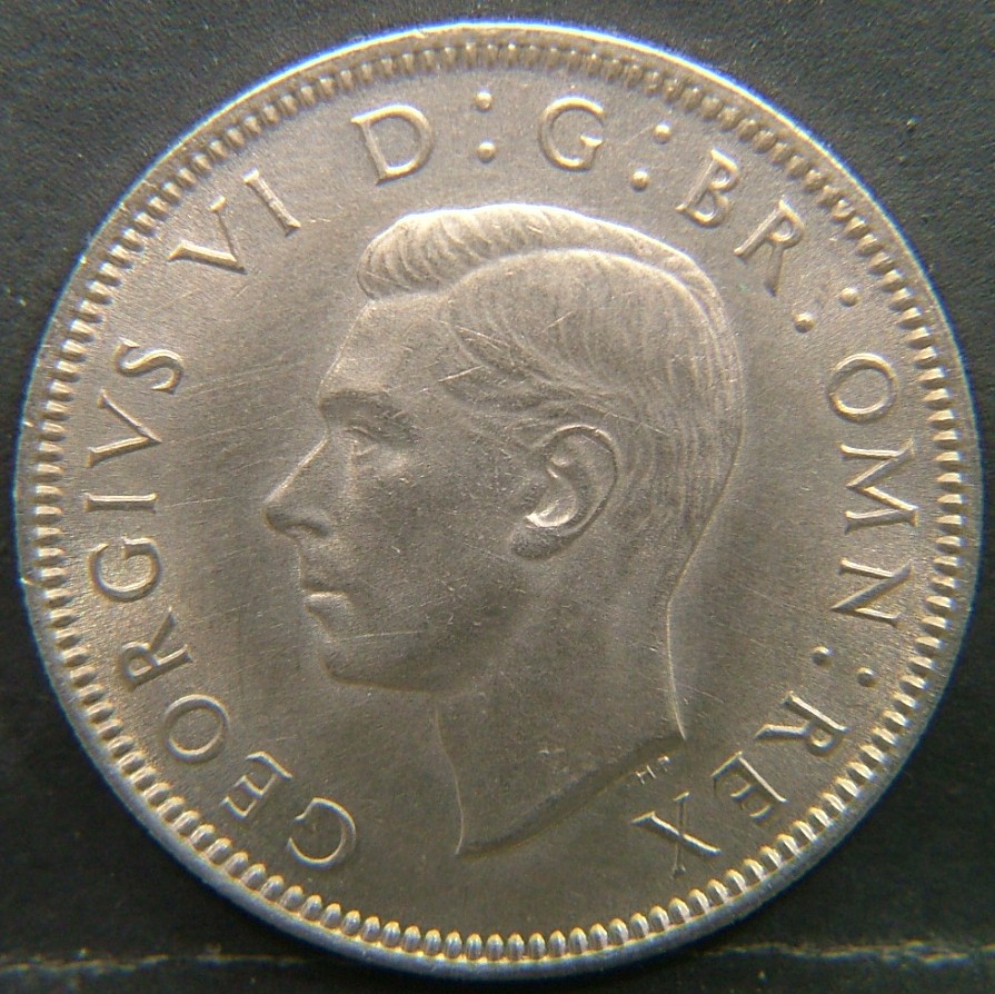 Back side of 🇬🇧 United Kingdom – Monarchs and Milestones 1 Shilling Scot  1948 object