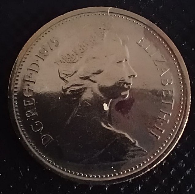 Back side of Great Britain 25 Pence 1975 coin