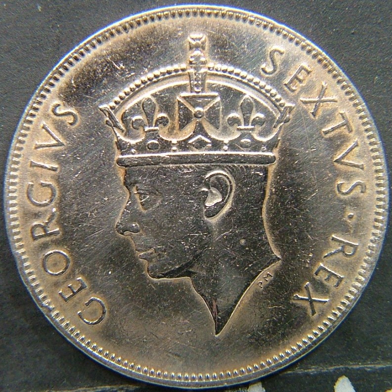 Back side of 🇬🇧 British East Africa – Colonial Coinage 1 Shilling  1948 object