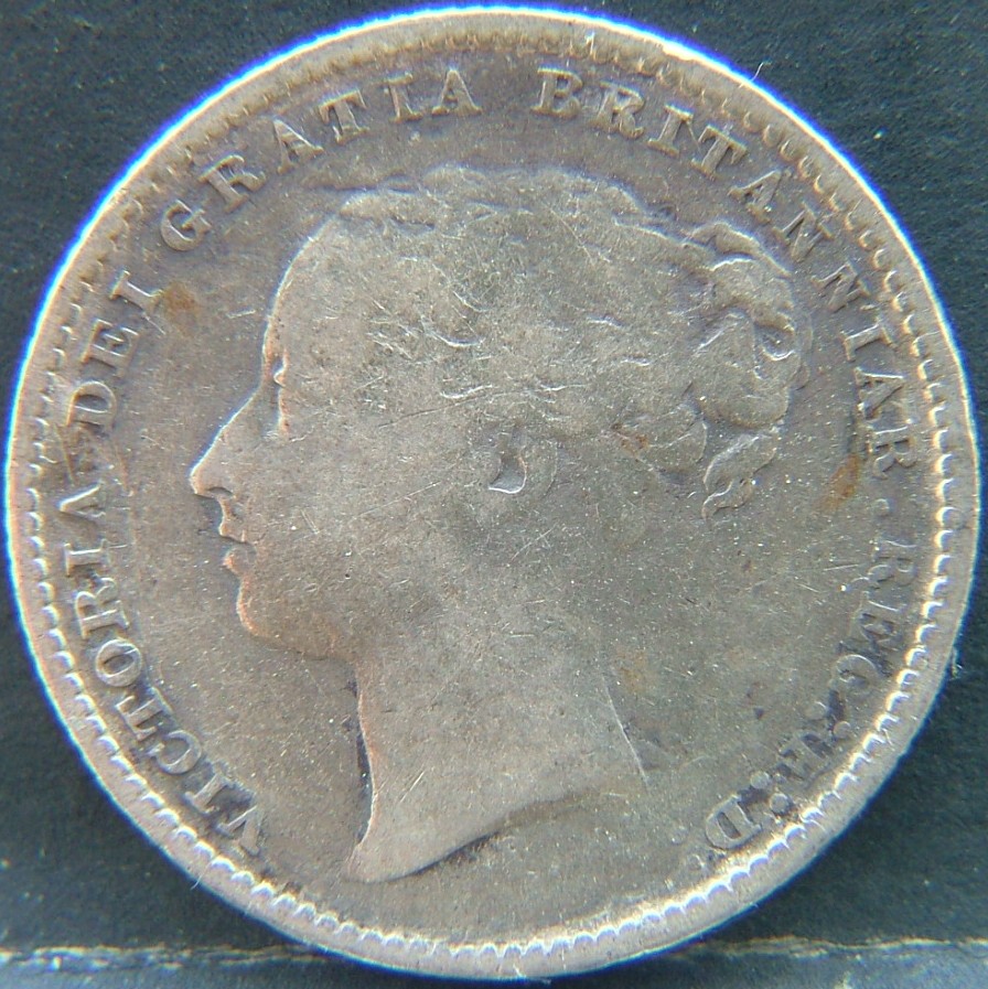 Front side of 🇬🇧 United Kingdom – Monarchs and Milestones 1 Shilling 1885 coin