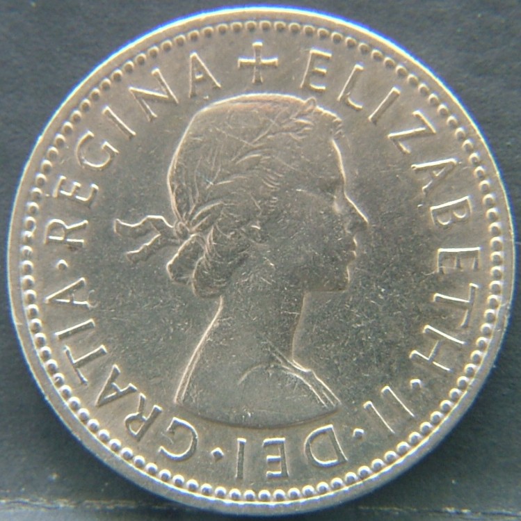 Front side of 🇬🇧 United Kingdom – Monarchs and Milestones 1 Shilling Scot 1954 coin