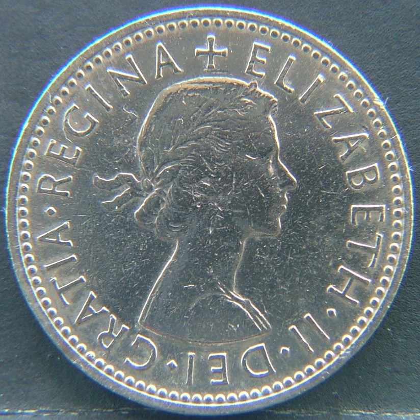Front side of 🇬🇧 United Kingdom – Monarchs and Milestones 1 Shilling Eng 1955 coin