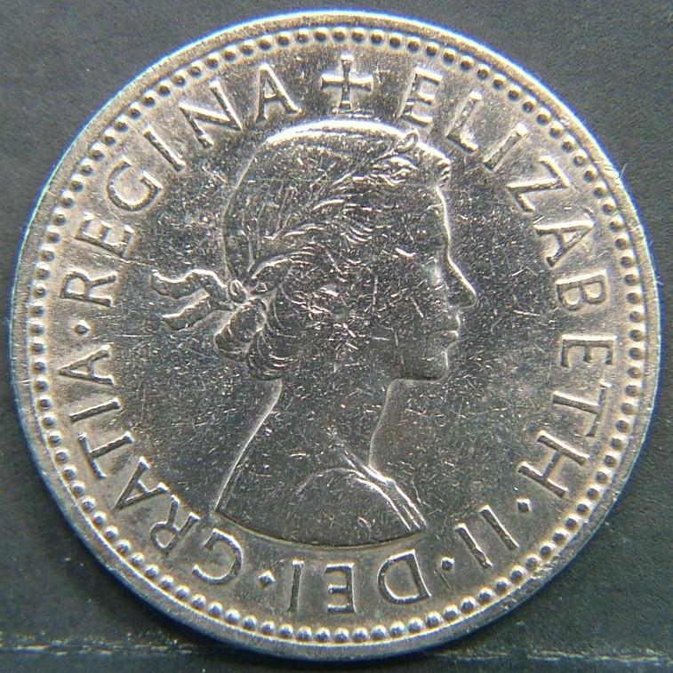 Back side of 🇬🇧 United Kingdom – Monarchs and Milestones 1 Shilling Eng 1955 coin