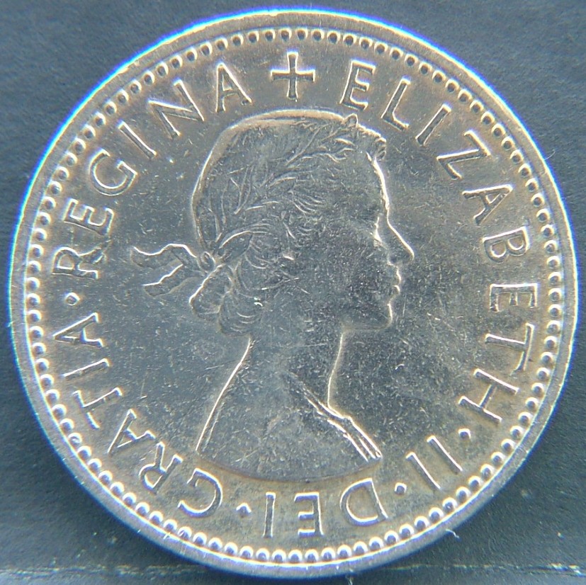 Front side of 🇬🇧 United Kingdom – Monarchs and Milestones 1 Shilling Eng 1956 coin
