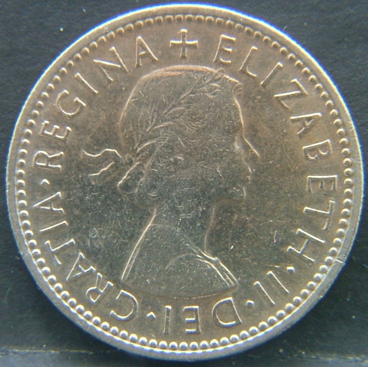 Front side of 🇬🇧 United Kingdom – Monarchs and Milestones 1 Shilling Eng 1956 coin