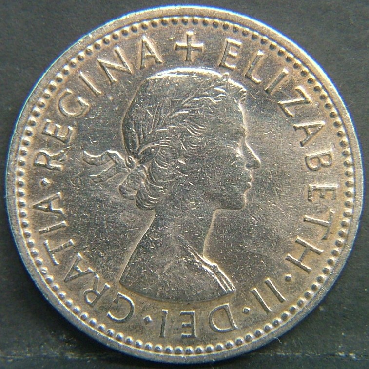 Back side of 🇬🇧 United Kingdom – Monarchs and Milestones 1 Shilling Eng 1956 coin