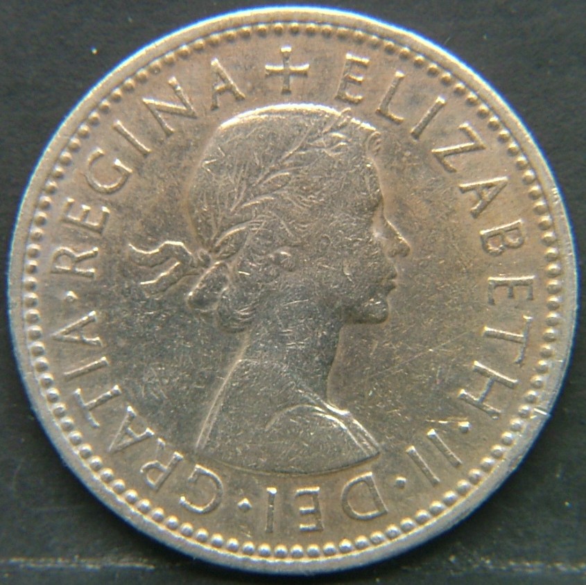 Back side of 🇬🇧 United Kingdom – Monarchs and Milestones 1 Shilling Eng 1956 coin