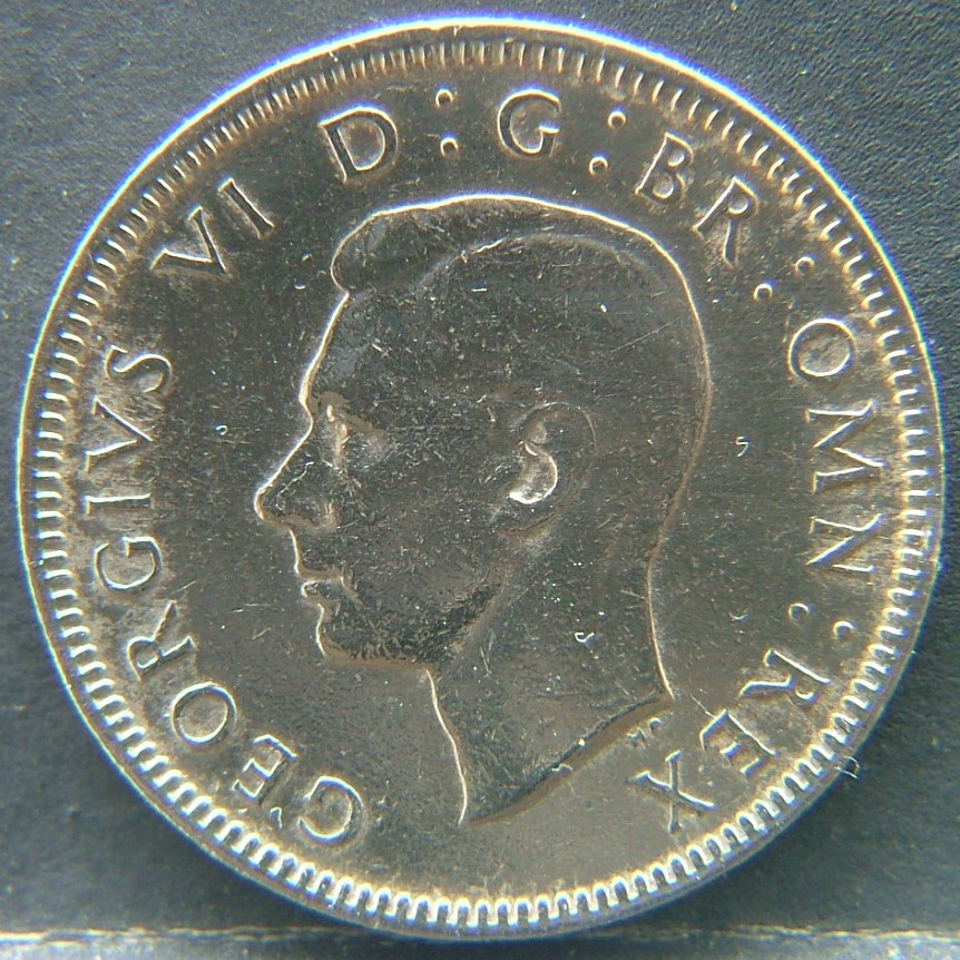 Front side of 🇬🇧 United Kingdom – Monarchs and Milestones 1 Shilling Eng 1948 coin
