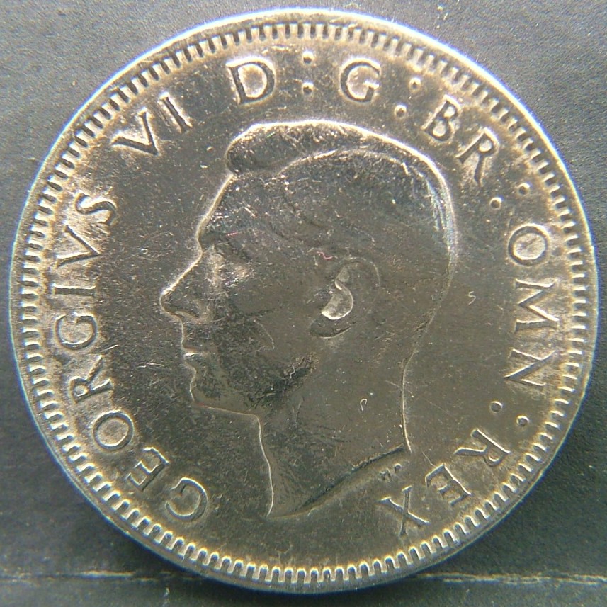 Back side of 🇬🇧 United Kingdom – Monarchs and Milestones 1 Shilling Eng 1948 coin