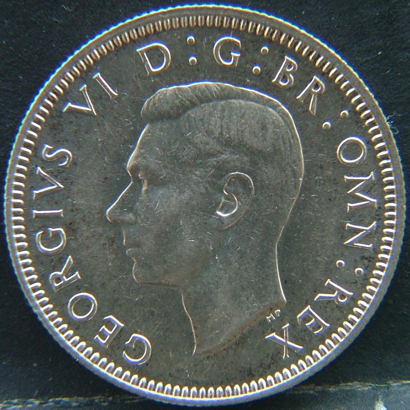 Front side of 🇬🇧 United Kingdom – Monarchs and Milestones 1 Shilling Eng 1944 coin